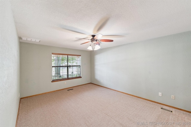 312 W Raleigh Pl, Broken Arrow, OK 74011 - carpeted spare room with a ceiling fan and a textured ceiling
