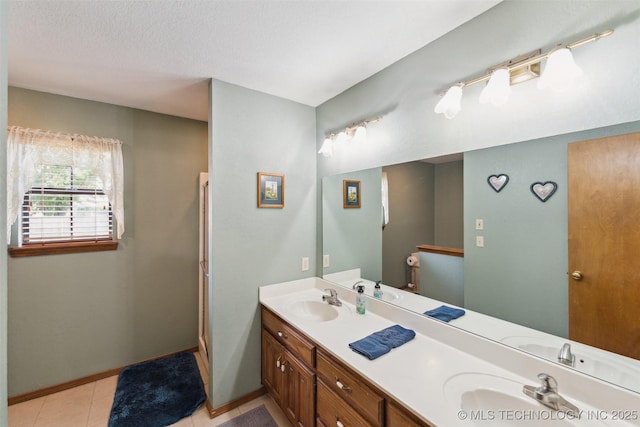 312 W Raleigh Pl, Broken Arrow, OK 74011 - bathroom with double vanity and tile patterned flooring
