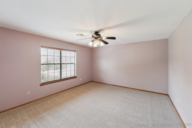 312 W Raleigh Pl, Broken Arrow, OK 74011 - spare room with carpet floors and a ceiling fan