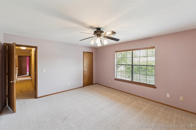 312 W Raleigh Pl, Broken Arrow, OK 74011 - empty room with light carpet and ceiling fan