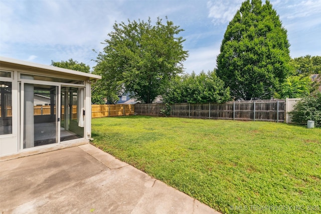 312 W Raleigh Pl, Broken Arrow, OK 74011 - fenced backyard featuring a patio and a sunroom