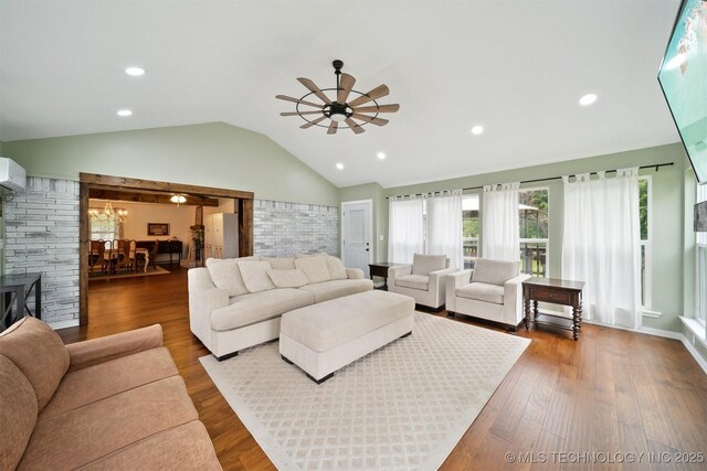 9065 E Prairie View Dr, Claremore, OK 74019 - living room featuring ceiling fan, vaulted ceiling, wood finished floors, a chandelier, and recessed lighting