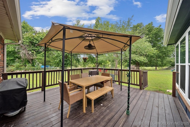 9065 E Prairie View Dr, Claremore, OK 74019 - wooden deck with grilling area, a yard, outdoor dining space, and a gazebo