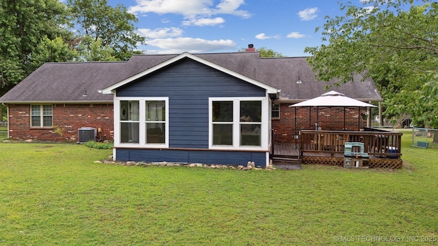 9065 E Prairie View Dr, Claremore, OK 74019 - back of house with a gazebo, a lawn, a deck, brick siding, and a chimney
