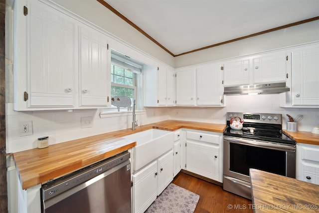 9065 E Prairie View Dr, Claremore, OK 74019 - kitchen with butcher block counters, stainless steel appliances, under cabinet range hood, ornamental molding, and tasteful backsplash