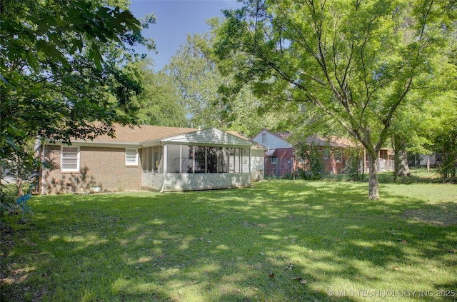 2513 S Sandusky Ave, Tulsa, OK 74114 - view of yard featuring a sunroom