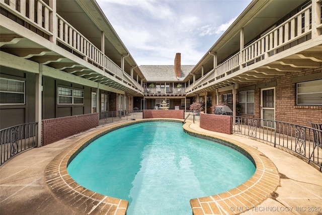 4517 S Peoria Ave Unit 31A, Tulsa, OK 74105 - view of pool with grilling area