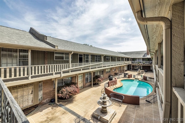 4517 S Peoria Ave Unit 31A, Tulsa, OK 74105 - swimming pool featuring a patio area