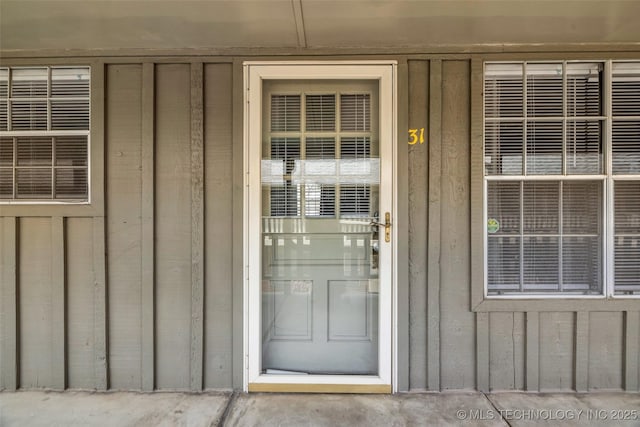 4517 S Peoria Ave Unit 31A, Tulsa, OK 74105 - view of exterior entry featuring board and batten siding