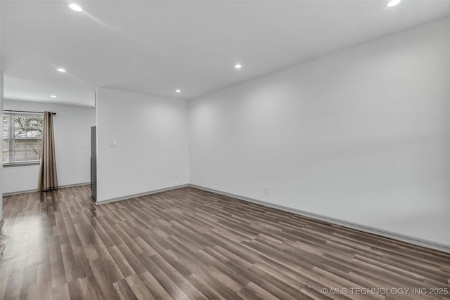 4517 S Peoria Ave Unit 31A, Tulsa, OK 74105 - spare room featuring recessed lighting and wood finished floors