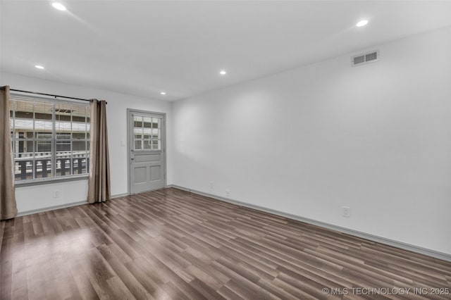4517 S Peoria Ave Unit 31A, Tulsa, OK 74105 - unfurnished room featuring wood finished floors and recessed lighting