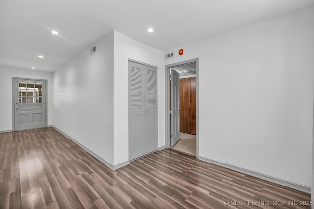 4517 S Peoria Ave Unit 31A, Tulsa, OK 74105 - unfurnished room with wood finished floors and recessed lighting