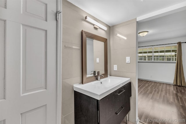 4517 S Peoria Ave Unit 31A, Tulsa, OK 74105 - bathroom with vanity and wood finished floors