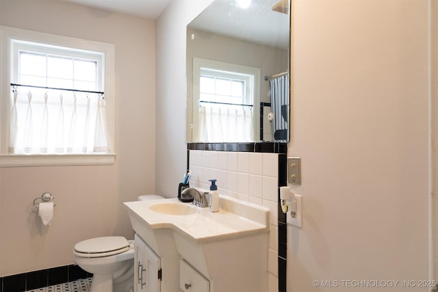 3524 E 12th Pl, Tulsa, OK 74112 - bathroom with vanity and backsplash