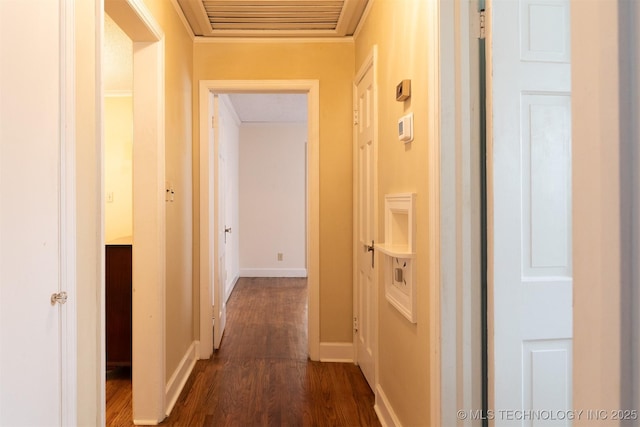 3524 E 12th Pl, Tulsa, OK 74112 - hall featuring dark wood finished floors and crown molding