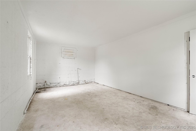 575 N 7th St, Muskogee, OK 74401 - spare room with unfinished concrete flooring