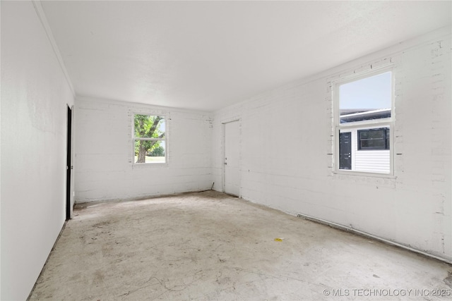 575 N 7th St, Muskogee, OK 74401 - unfurnished room featuring unfinished concrete floors