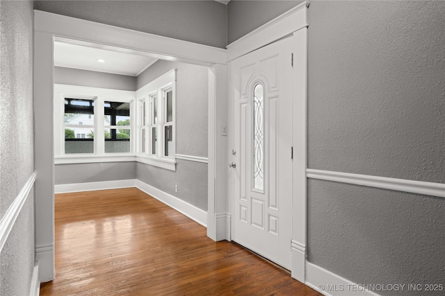 575 N 7th St, Muskogee, OK 74401 - foyer entrance with a textured wall and wood finished floors