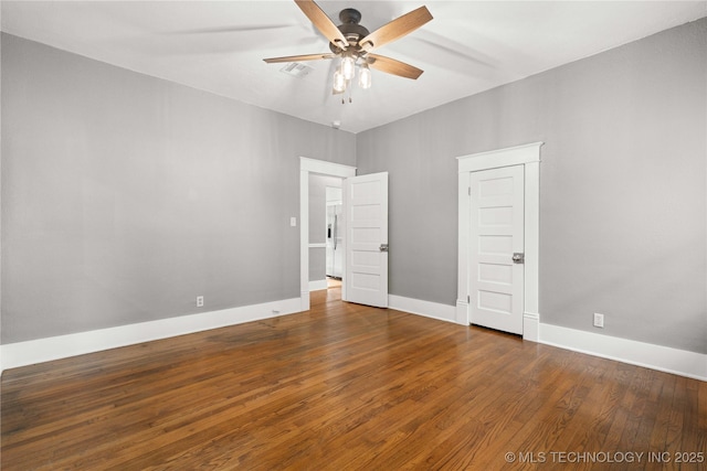 575 N 7th St, Muskogee, OK 74401 - unfurnished bedroom with wood finished floors and ceiling fan
