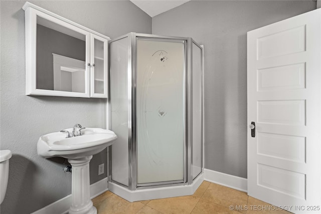 575 N 7th St, Muskogee, OK 74401 - bathroom featuring a stall shower and tile patterned flooring