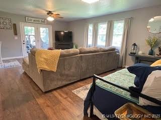 25961 S 621st Rd, Grove, OK 74344 - living room featuring wood finished floors and ceiling fan