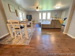 25961 S 621st Rd, Grove, OK 74344 - dining space featuring a ceiling fan and wood finished floors