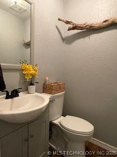 25961 S 621st Rd, Grove, OK 74344 - bathroom with vanity and toilet