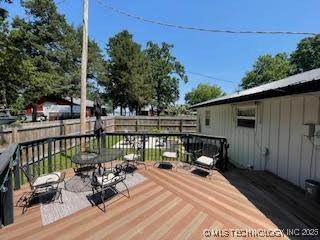 25961 S 621st Rd, Grove, OK 74344 - wooden deck with a fenced backyard