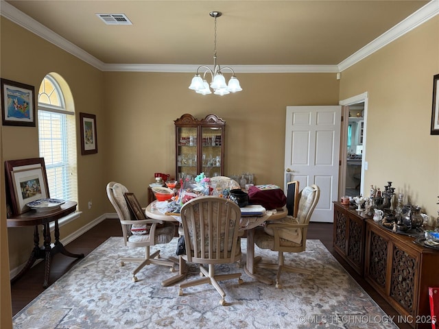 607 Nelson, Mcalester, OK 74501 - dining space with crown molding and wood finished floors