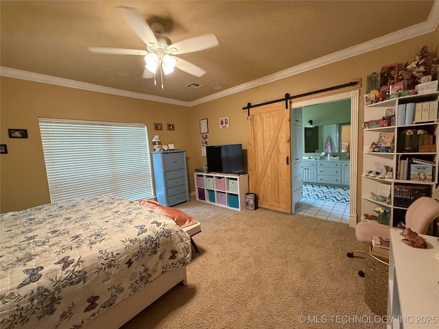 607 Nelson, Mcalester, OK 74501 - bedroom with a barn door, light carpet, ornamental molding, a ceiling fan, and ensuite bath