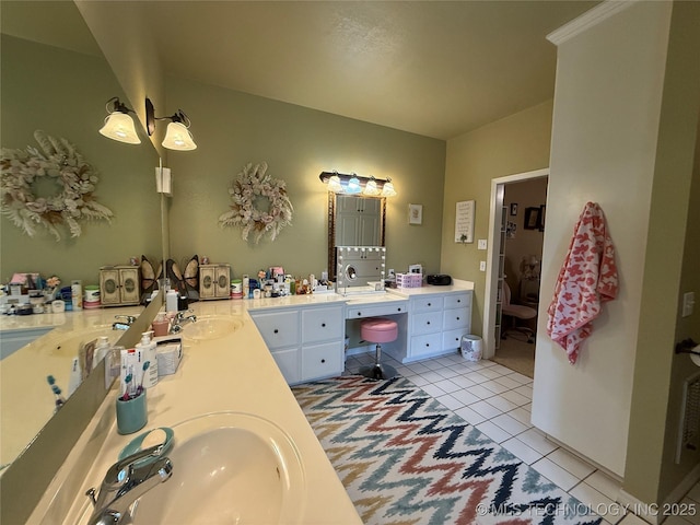 607 Nelson, Mcalester, OK 74501 - bathroom featuring tile patterned flooring and double vanity