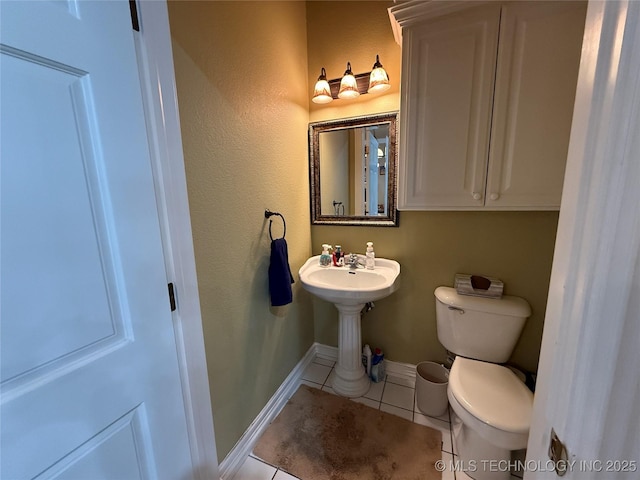 607 Nelson, Mcalester, OK 74501 - bathroom with tile patterned flooring and toilet