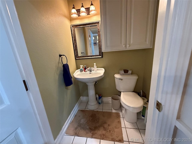 607 Nelson, Mcalester, OK 74501 - bathroom featuring tile patterned flooring and toilet