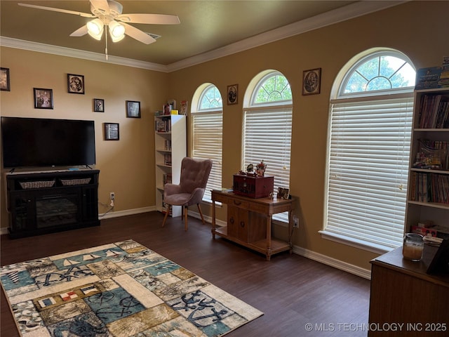 607 Nelson, Mcalester, OK 74501 - living room with ceiling fan, wood finished floors, plenty of natural light, and ornamental molding