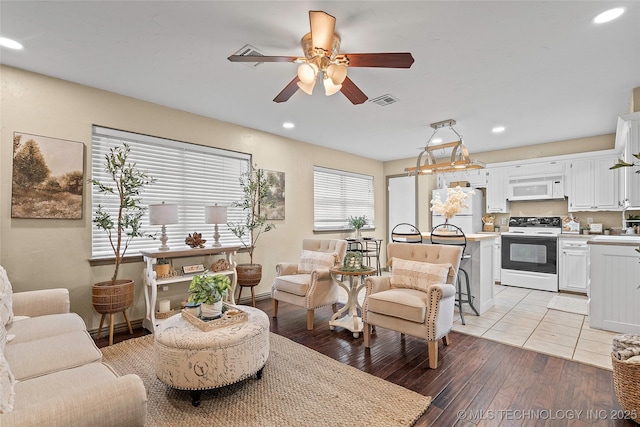 1604 9th Ave NW, Ardmore, OK 73401 - living area with a ceiling fan, recessed lighting, and light wood-style flooring