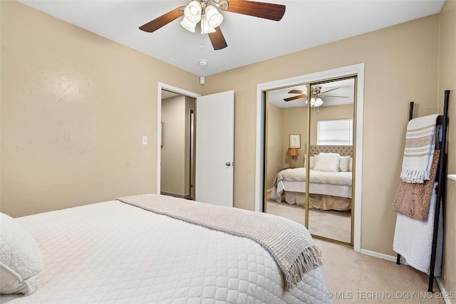 1604 9th Ave NW, Ardmore, OK 73401 - bedroom featuring light carpet, ceiling fan, and a closet