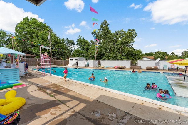 5914 E 26th St, Tulsa, OK 74114 - community pool featuring a patio