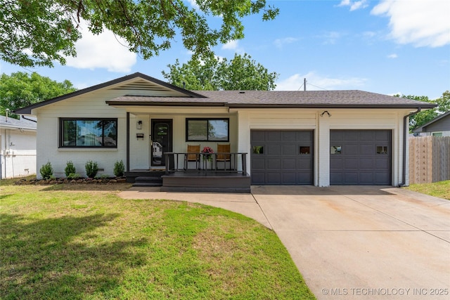 5914 E 26th St, Tulsa, OK 74114 - ranch-style house featuring driveway, covered porch, a garage, and brick siding
