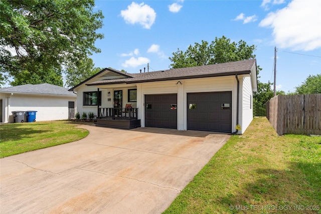 5914 E 26th St, Tulsa, OK 74114 - single story home featuring a porch, driveway, a garage, and a shingled roof