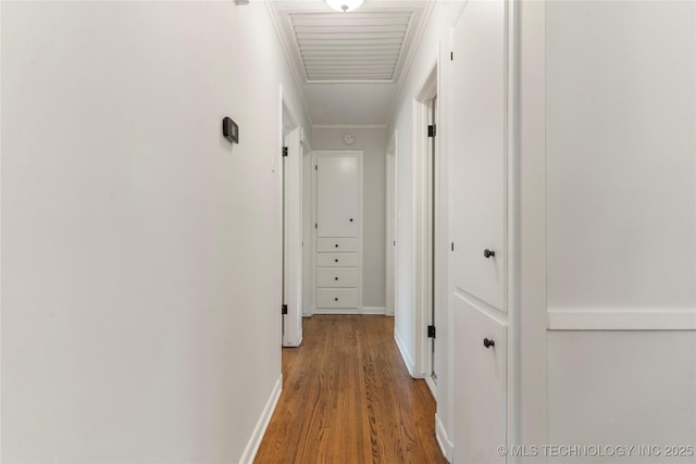 5914 E 26th St, Tulsa, OK 74114 - hallway featuring wood finished floors and crown molding