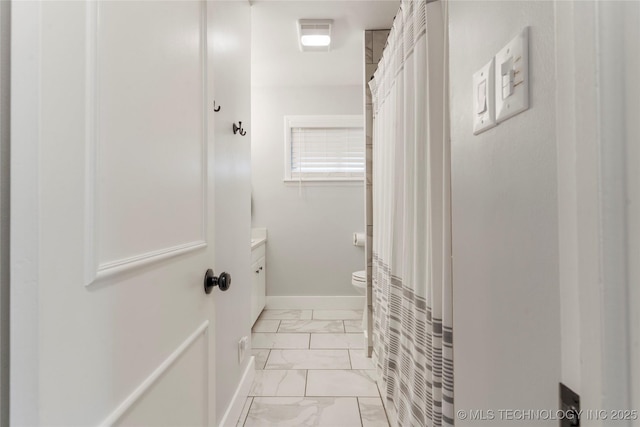 5914 E 26th St, Tulsa, OK 74114 - bathroom with marble look tile flooring, vanity, and a shower with curtain