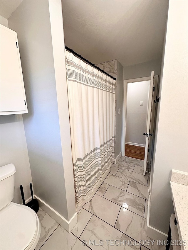 5914 E 26th St, Tulsa, OK 74114 - bathroom with marble finish flooring, vanity, and curtained shower