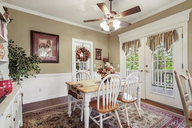 1110 N Renaissance Dr, Sand Springs, OK 74063 - dining area with wood finished floors, ornamental molding, ceiling fan, wainscoting, and french doors