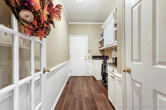 1110 N Renaissance Dr, Sand Springs, OK 74063 - washroom featuring crown molding and dark wood-style floors