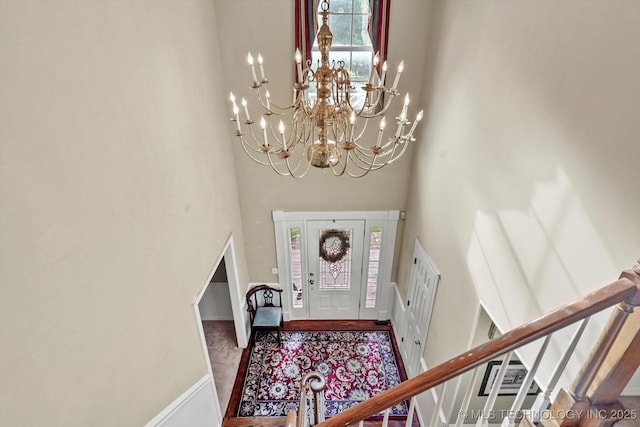 1110 N Renaissance Dr, Sand Springs, OK 74063 - foyer entrance with a high ceiling, a chandelier, and stairway