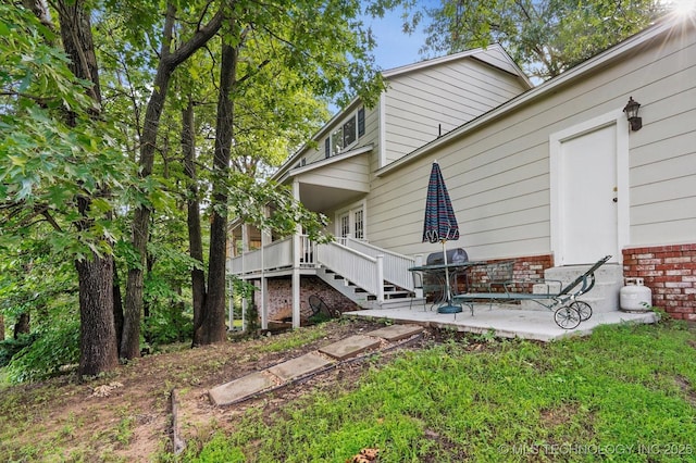 1110 N Renaissance Dr, Sand Springs, OK 74063 - rear view of house with a patio and stairs