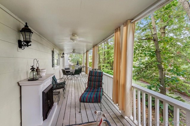 1110 N Renaissance Dr, Sand Springs, OK 74063 - wooden terrace featuring a ceiling fan and outdoor dining space