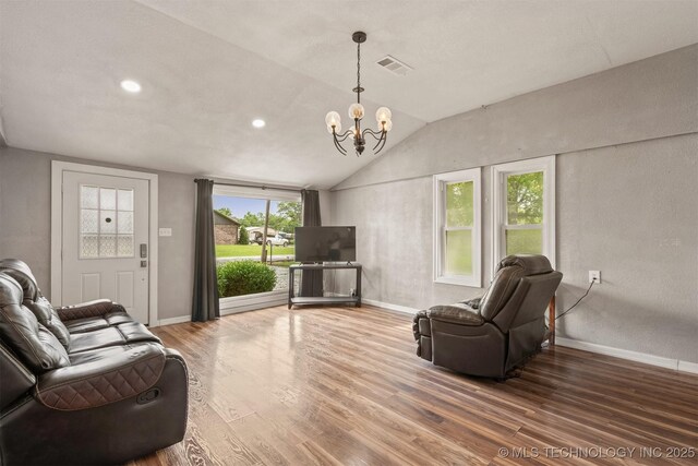 705 W Center St, Collinsville, OK 74021 - living room featuring wood finished floors, a chandelier, lofted ceiling, and recessed lighting
