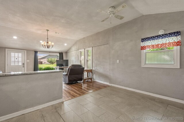 705 W Center St, Collinsville, OK 74021 - living area featuring vaulted ceiling, a chandelier, ceiling fan, and recessed lighting