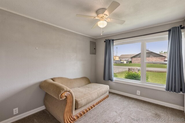 705 W Center St, Collinsville, OK 74021 - living area with carpet floors, a ceiling fan, electric panel, and crown molding